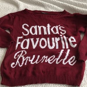 Santa’s favourite brunette ugly Christmas sweater.